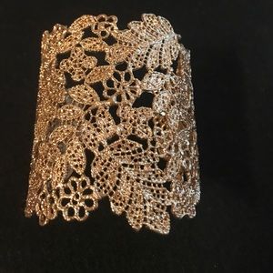 Gold tone floral cuff bracelet